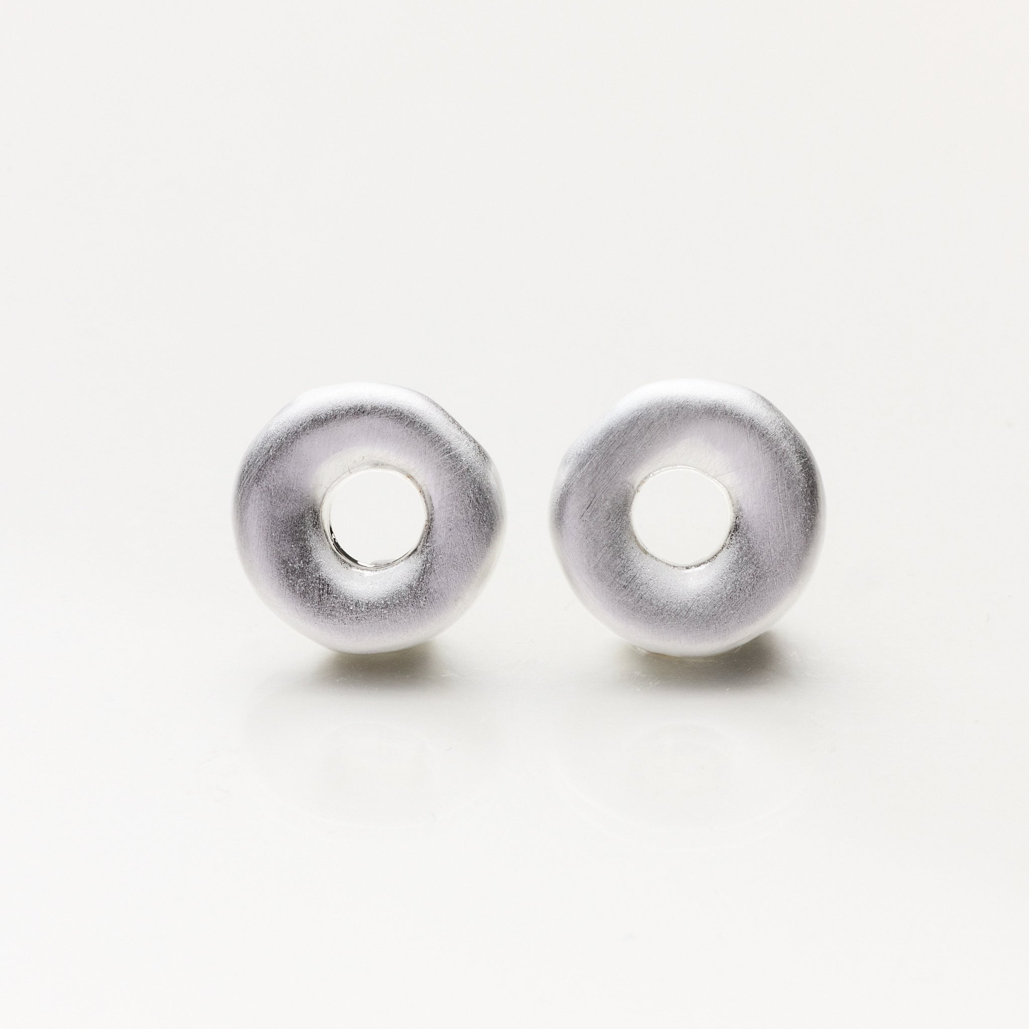 Lara & Ela | Love Makes The World Go Round Silver Earrings - Lara & Ela