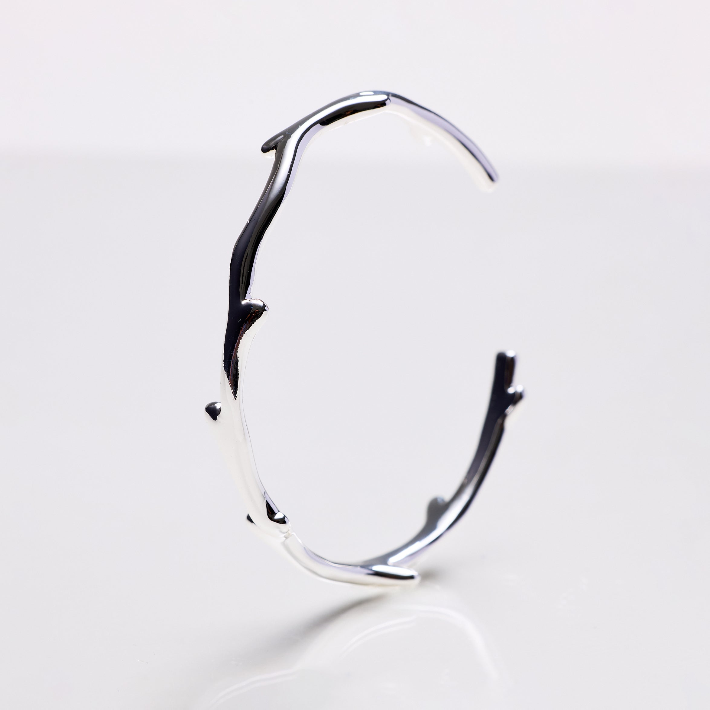 Lara & Ela | Head Over Heels Silver Bangle - Lara & Ela