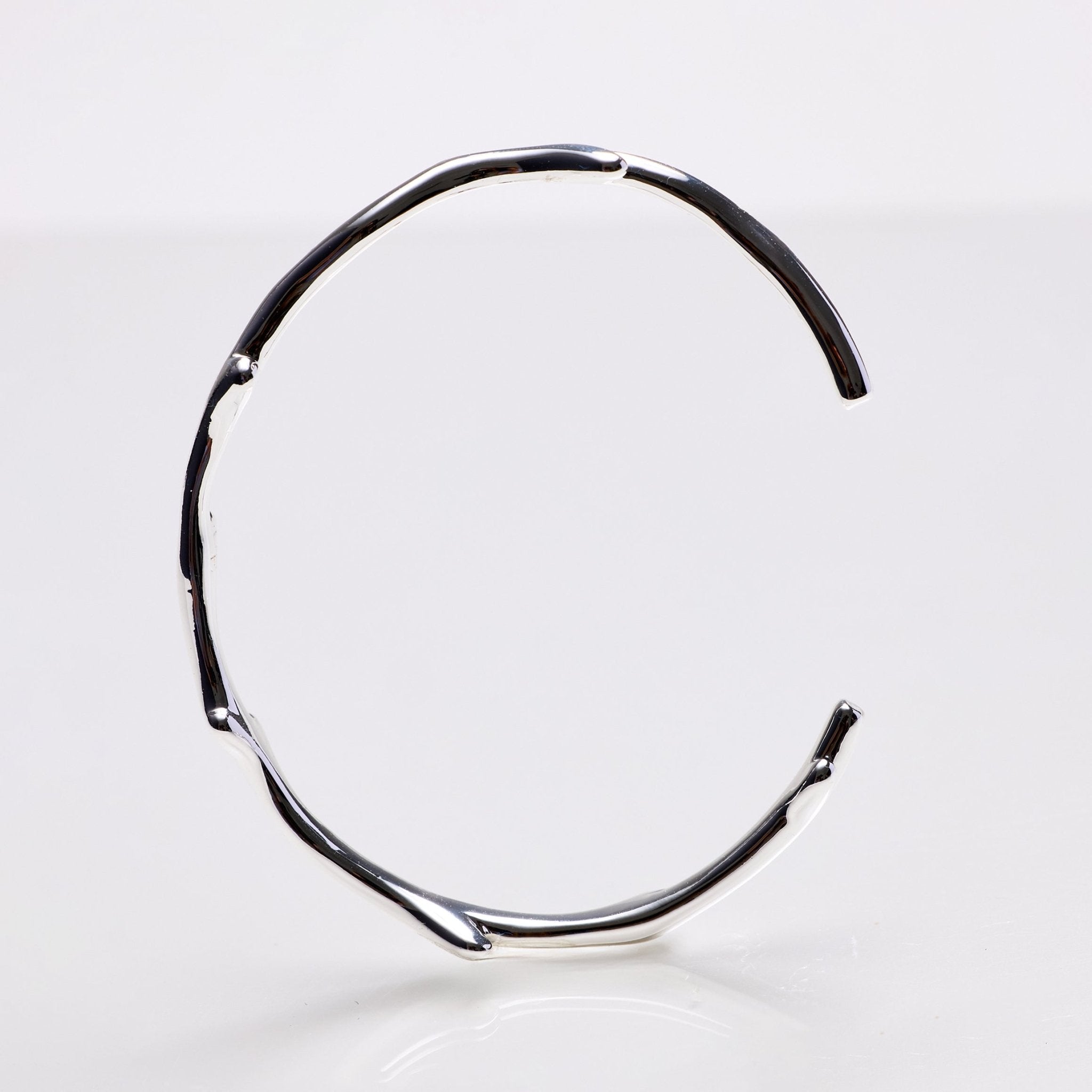 Lara & Ela | Head Over Heels Silver Bangle - Lara & Ela