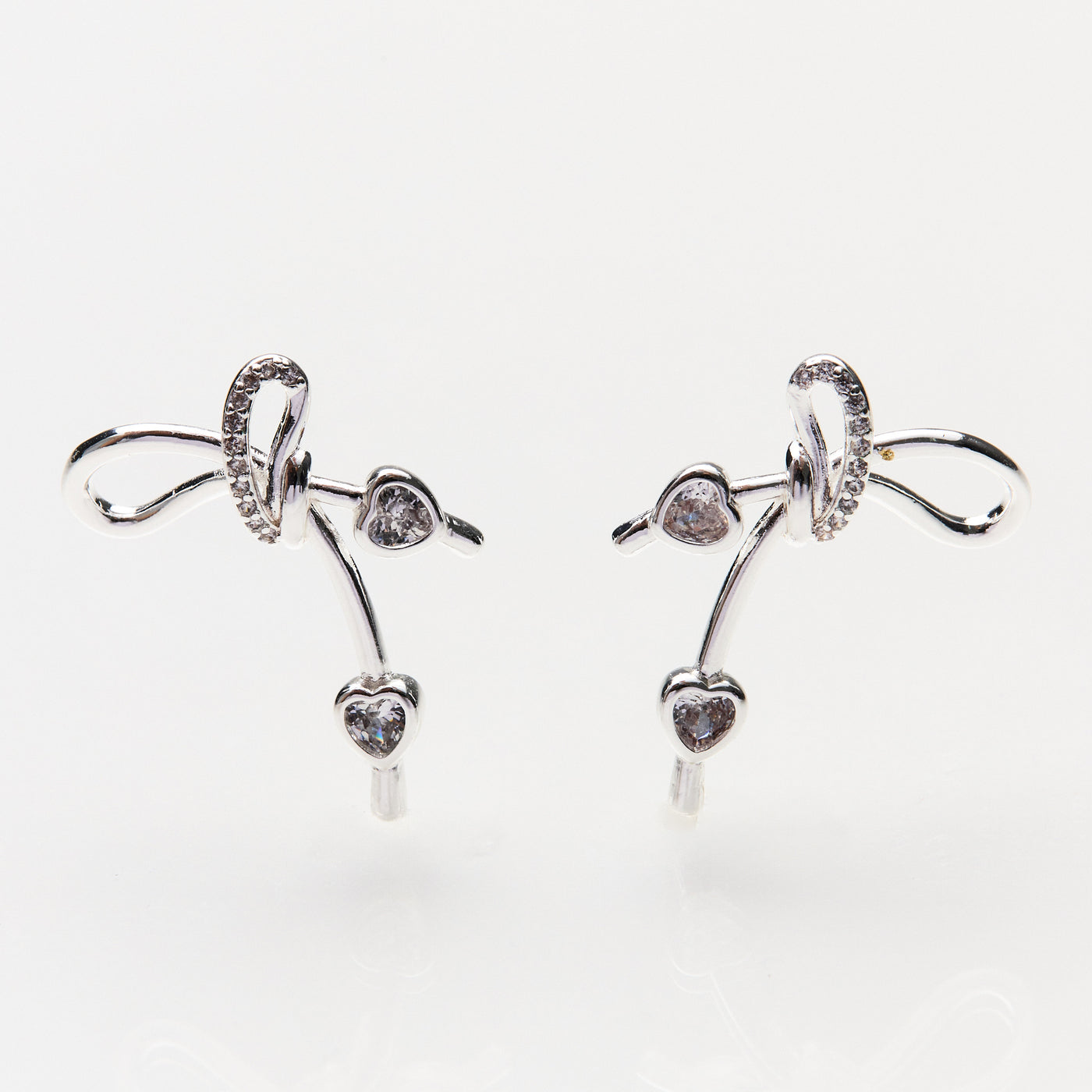Lara & Ela | It's Criminal To Look This Good Silver Earrings - Lara & Ela